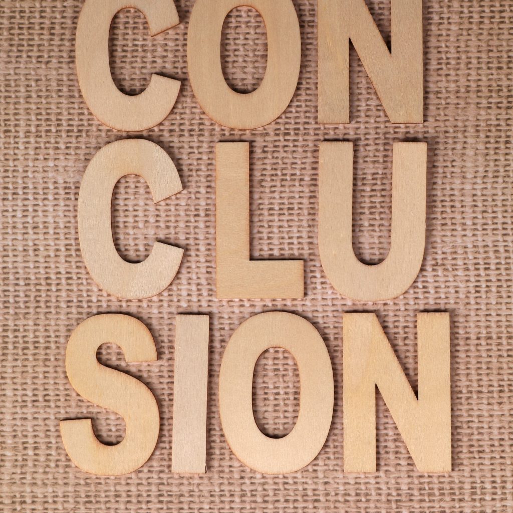 Wooden letters spelling 'CONCLUSION' on textured burlap background.